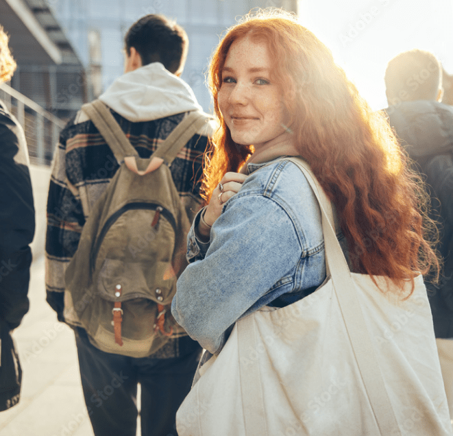 teenage girl walking to class