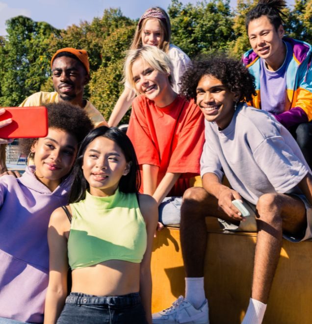 group of teenagers taking a selfie